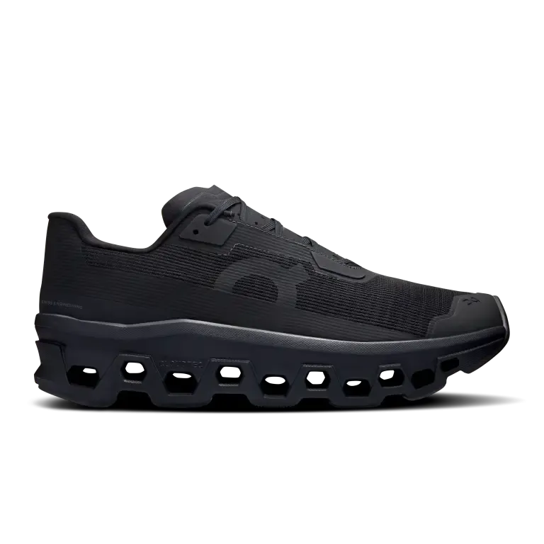 Cloudmonster Void Negro Negro En Cloudmonster Void Black/Black, una zapatilla para correr ligera con gran amortiguación y un aspecto moderno.